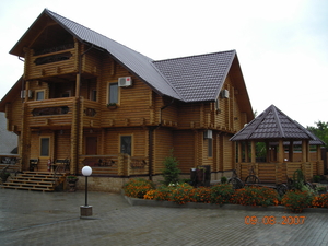 Деревяные дома из оцилиндрованого бруса грн.